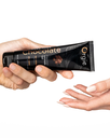 Lube Tube Chocolate_HandShot.webp